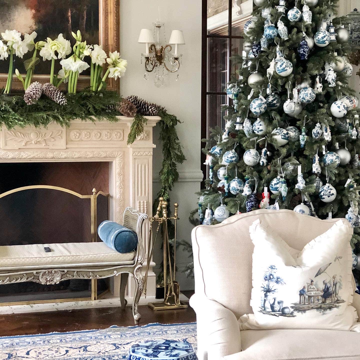 Christmas mantel with classic decor and white flowers