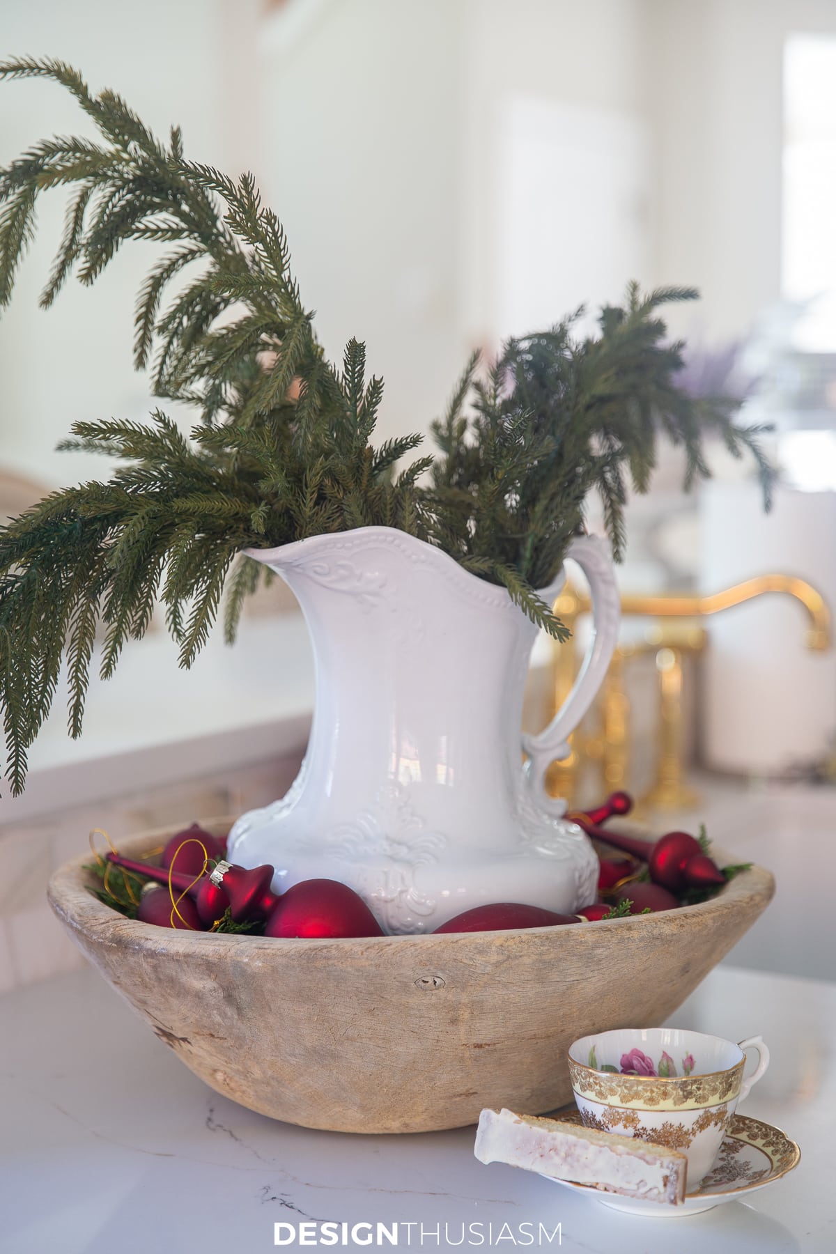 french country kitchen with white ironstone pitcher in wood bowl