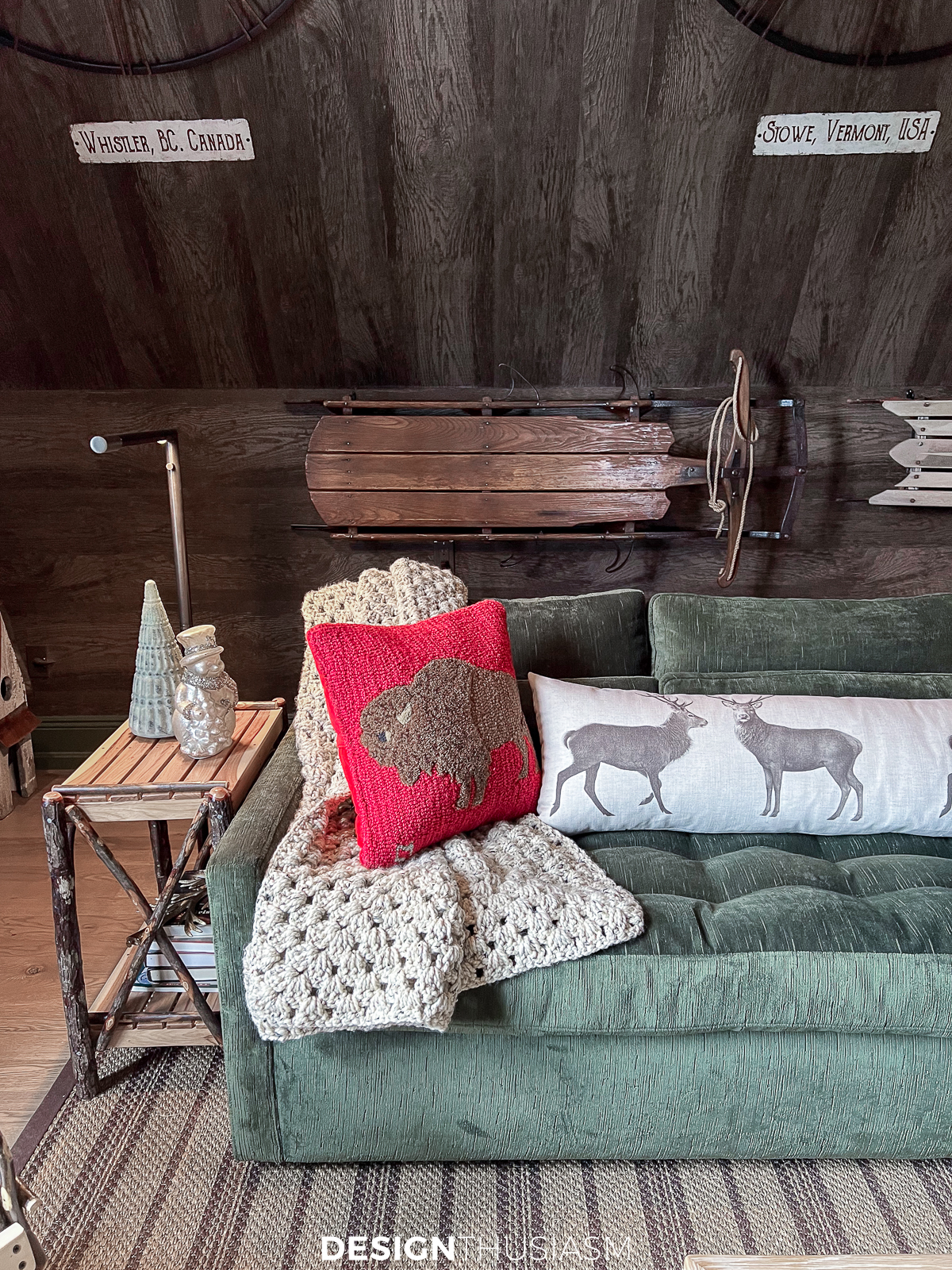 cozy cabin sofa with rustic christmas decorations