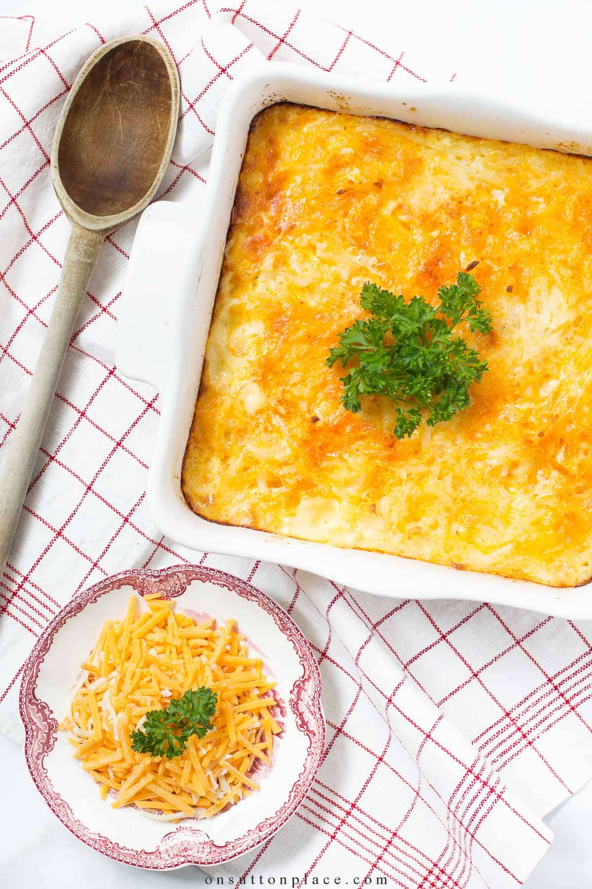 delmonico potatoes recipe in square ruffled dish