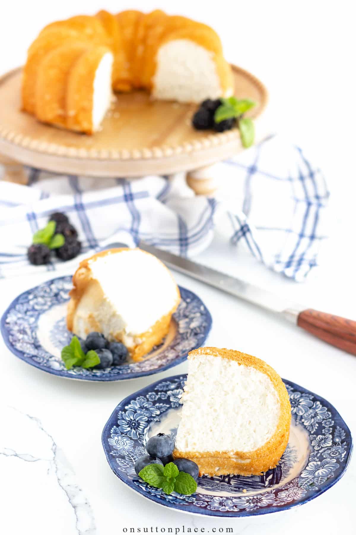 slices of angel food cake on small blue plates