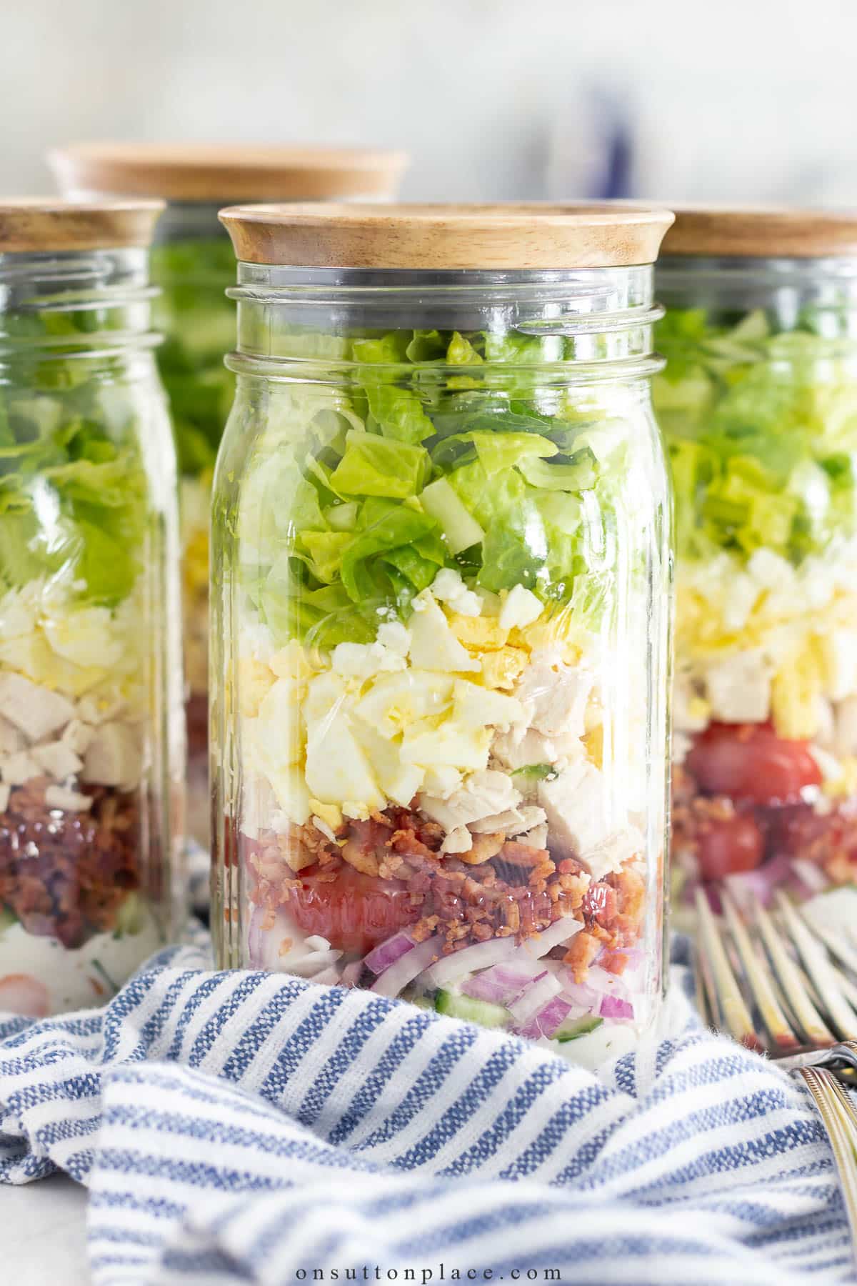 layered meal prep salad in mason jar