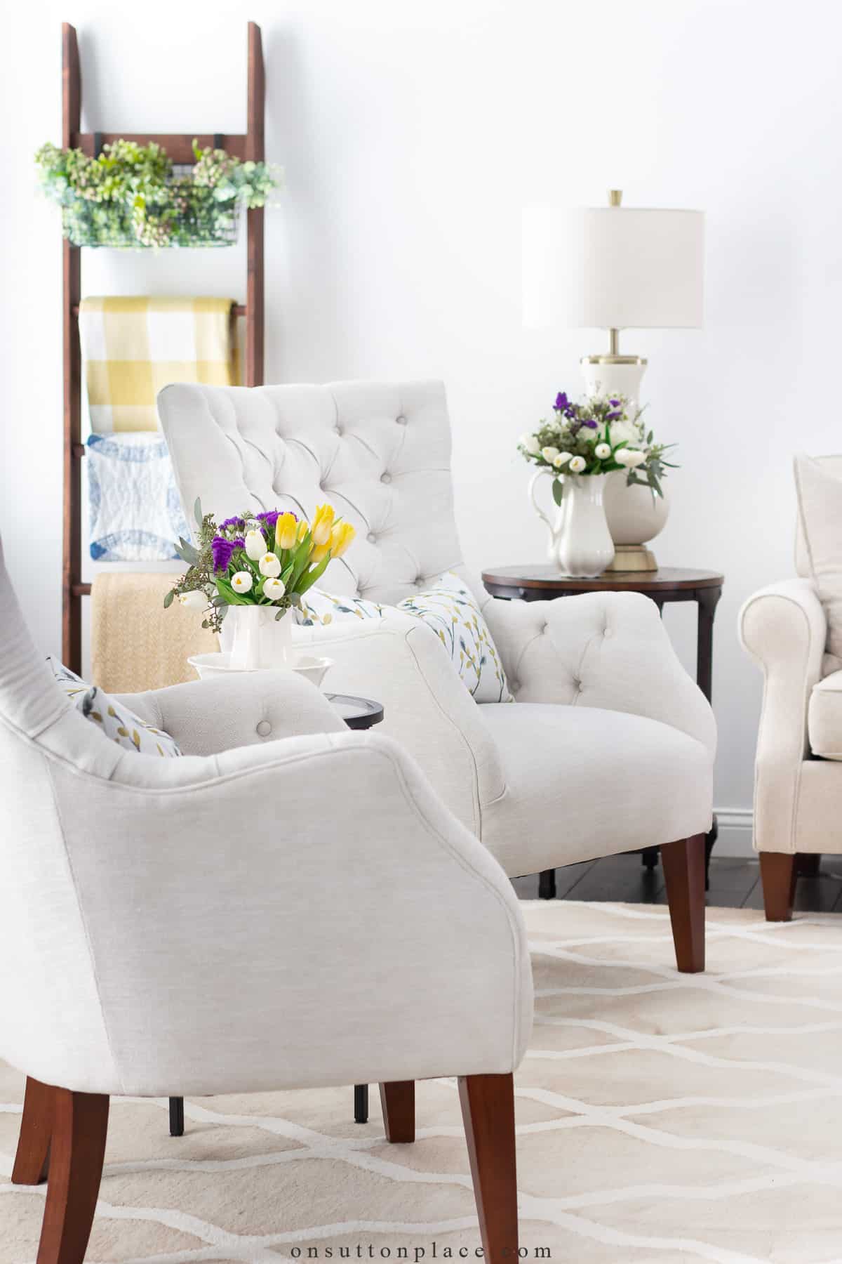 neutral living room with yellow spring decor
