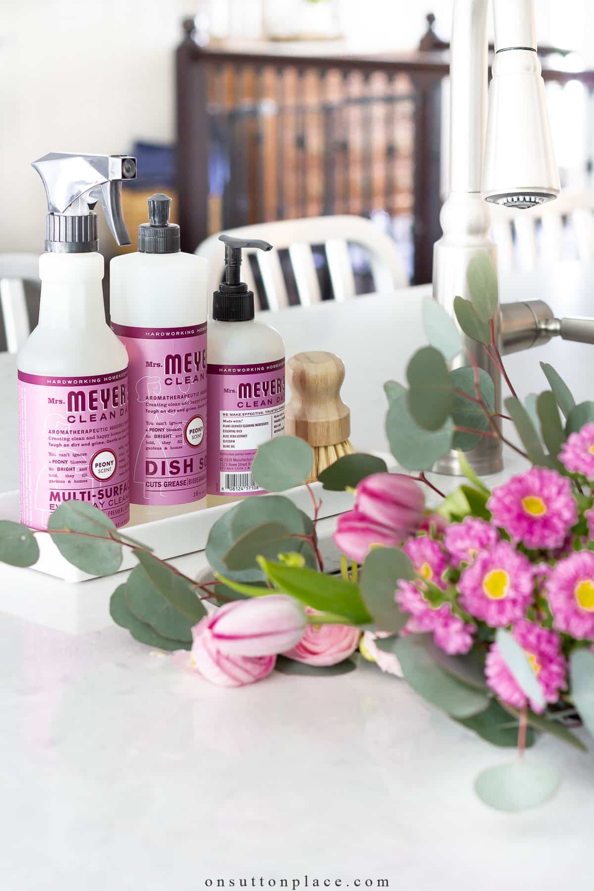 mrs.-meyers-peony-products-beside-sink-with-flowers
