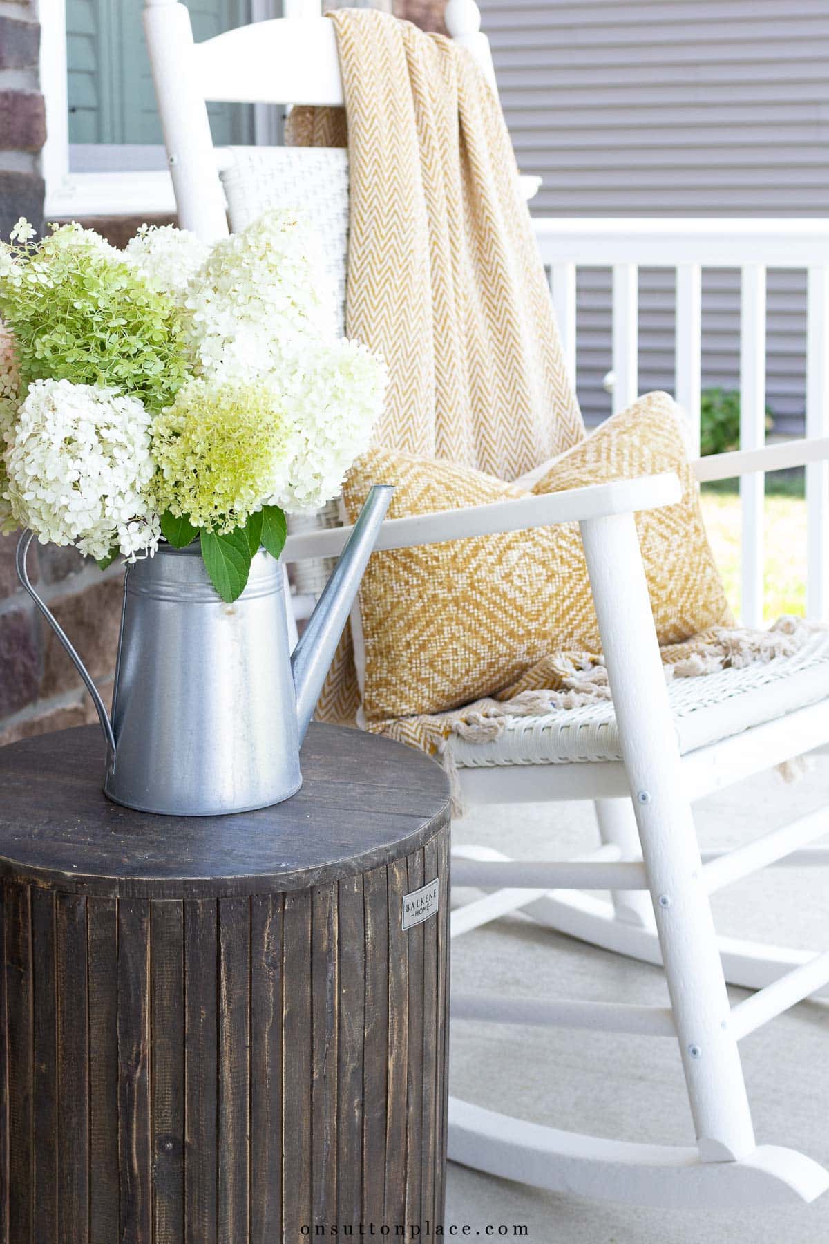 fall porch decor white rocker gold throw blanket pillow wood garden stool