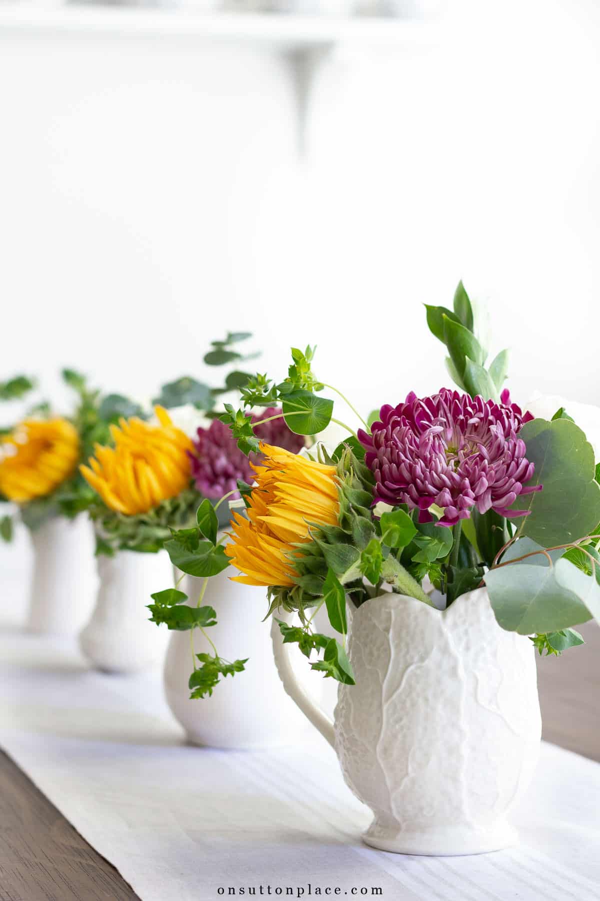 neutral pitchers fall centerpiece ideas sunflowers mum