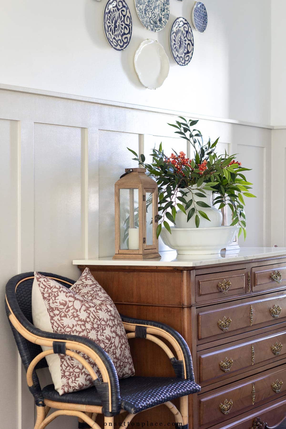 board and batten in entry decorated for Thanksgiving