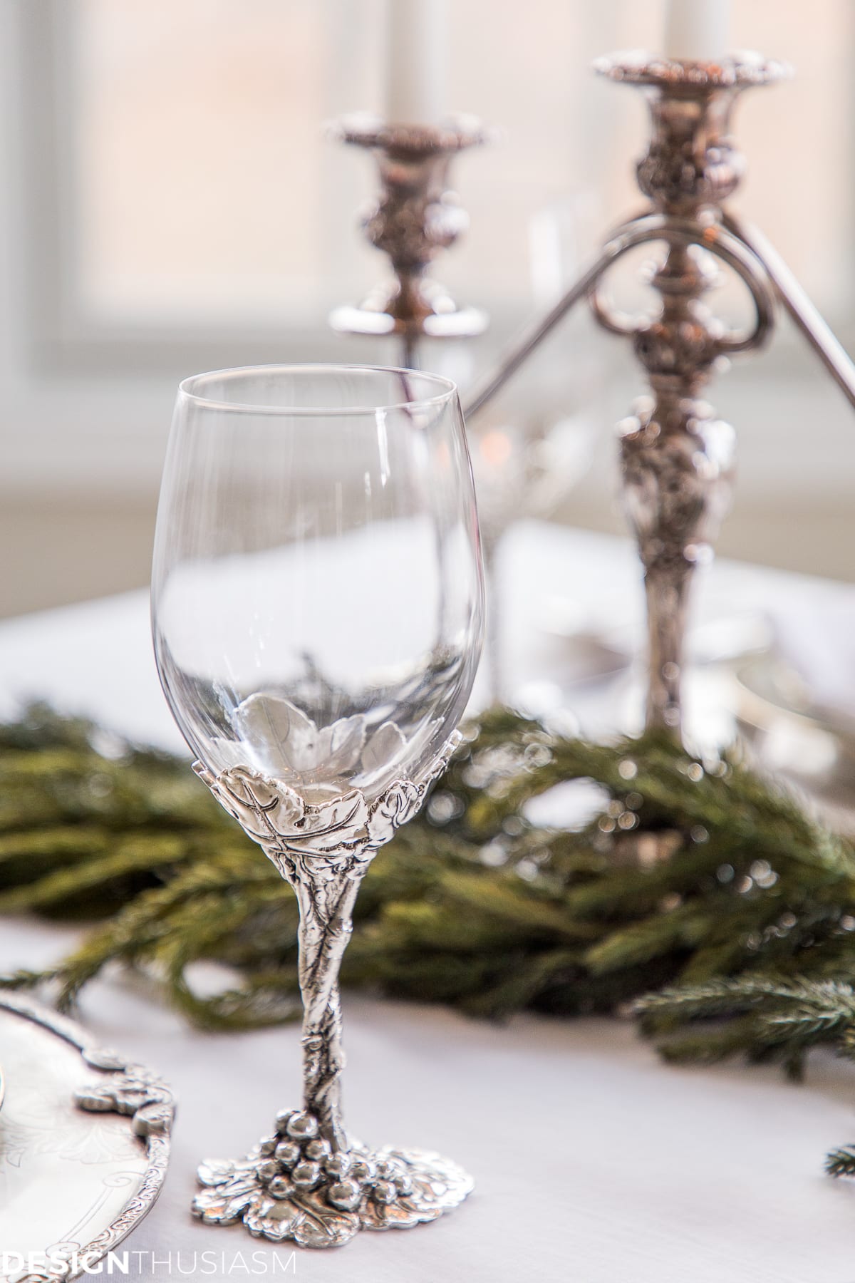 Christmas table setting wine goblets