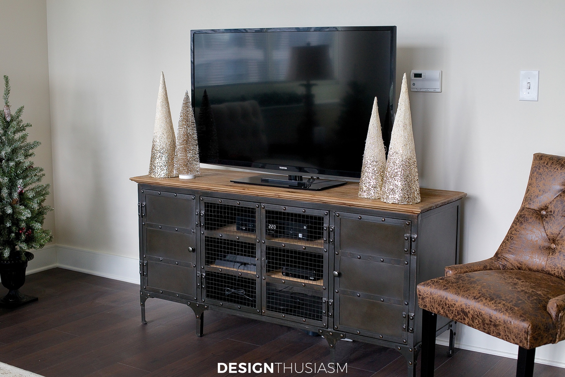 Christmas decor cone trees on the TV stand