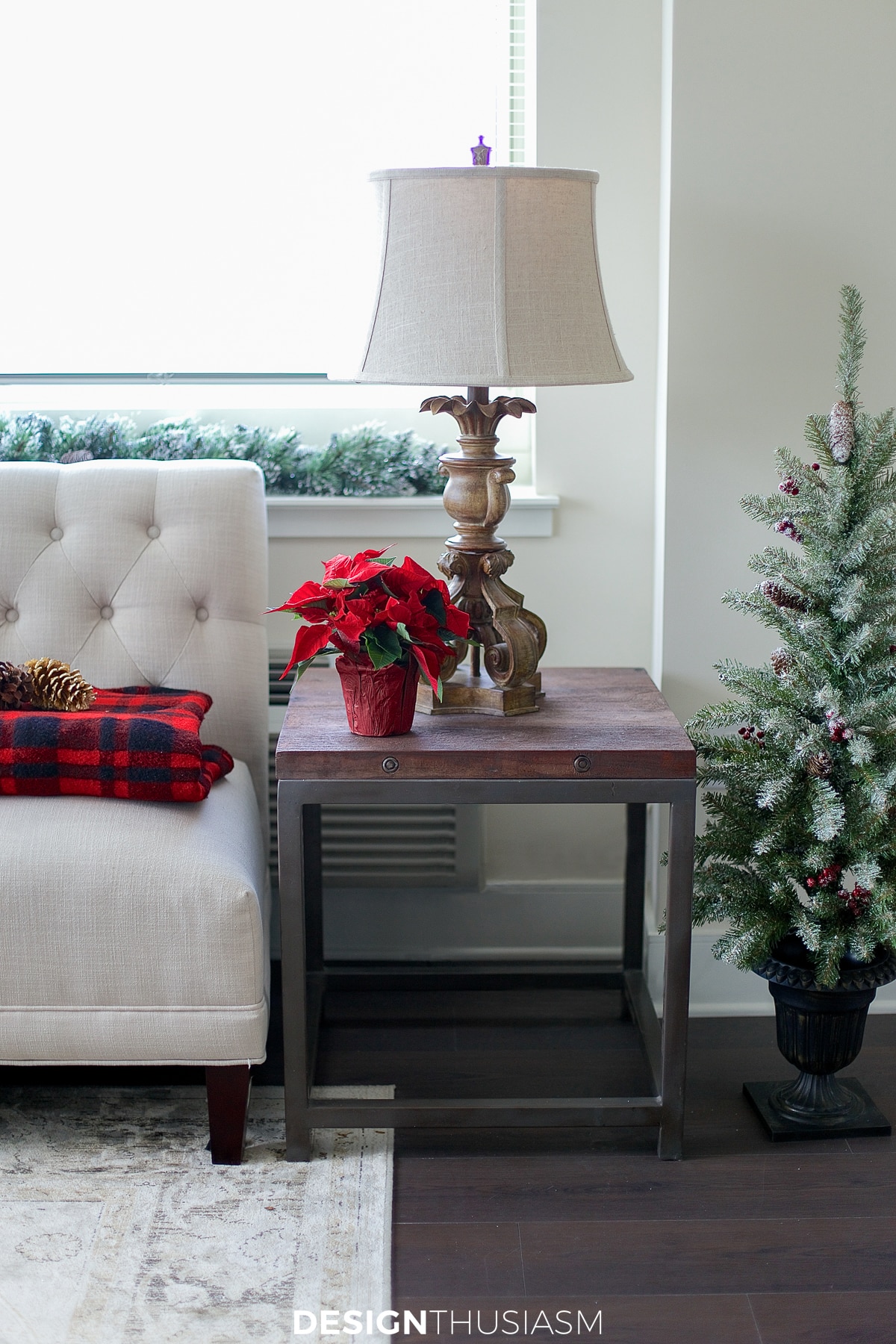 Christmas decor poinsettia on an end table