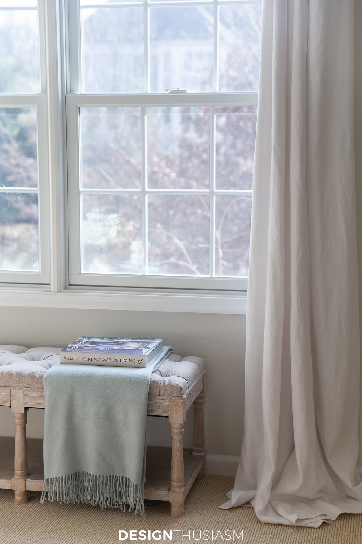 indoor she shed bench with throw blanket