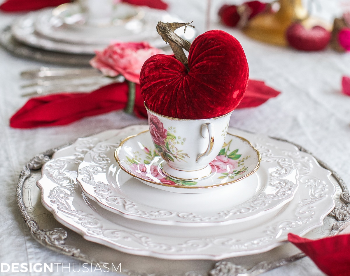 Textured cream plates with red velvet heart