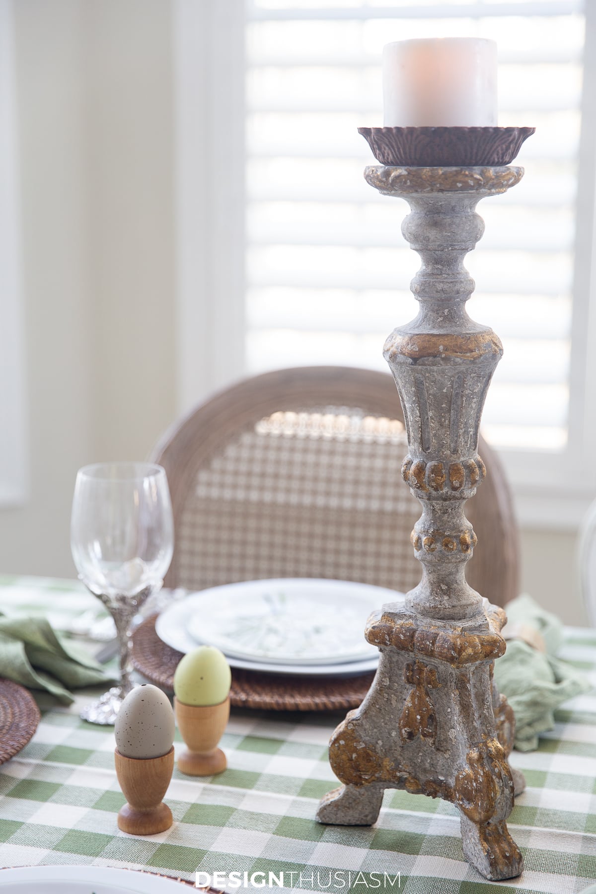 distressed candlestick on a spring tablescape