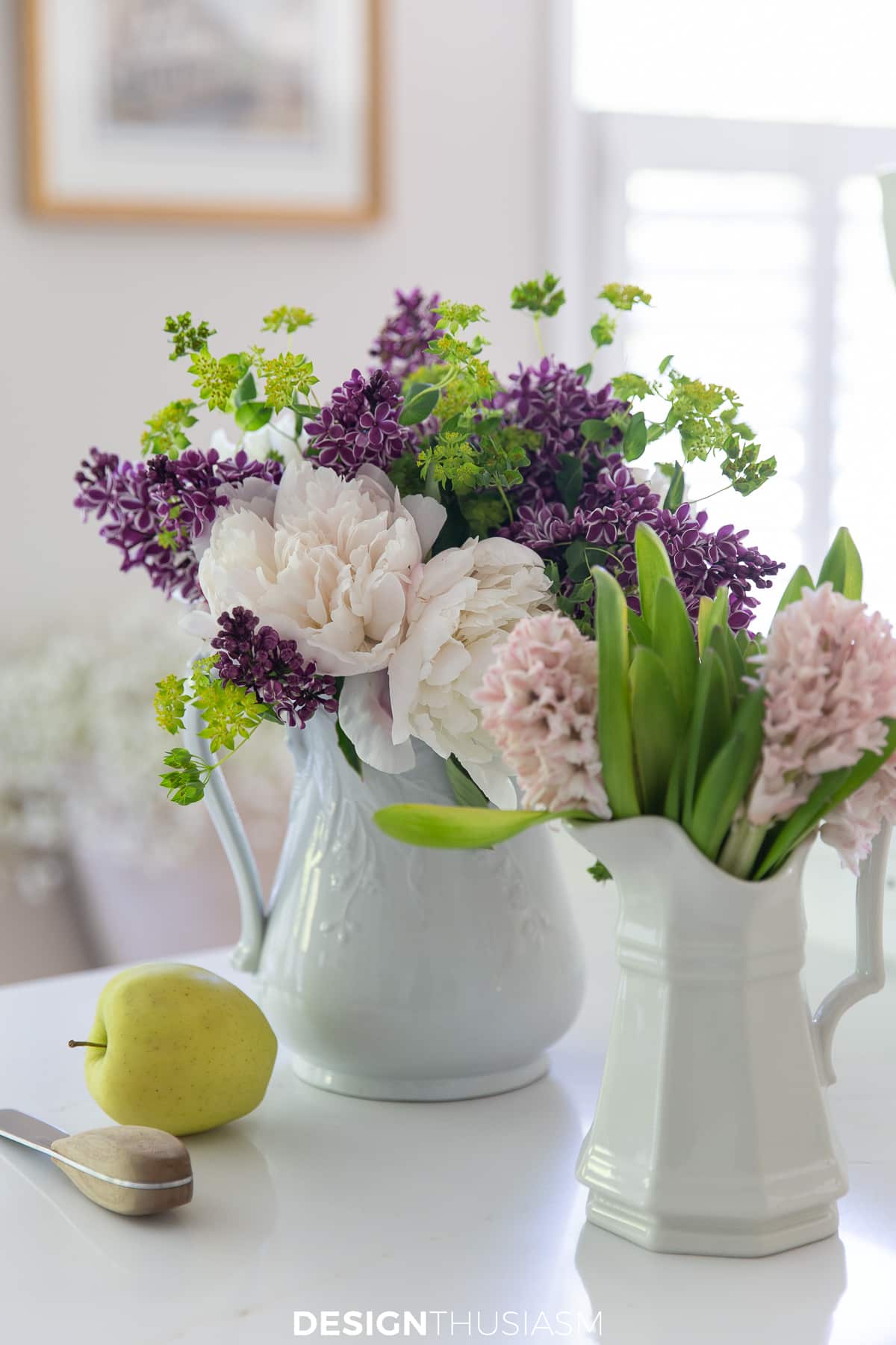 spring flowers in ironstone pitchers