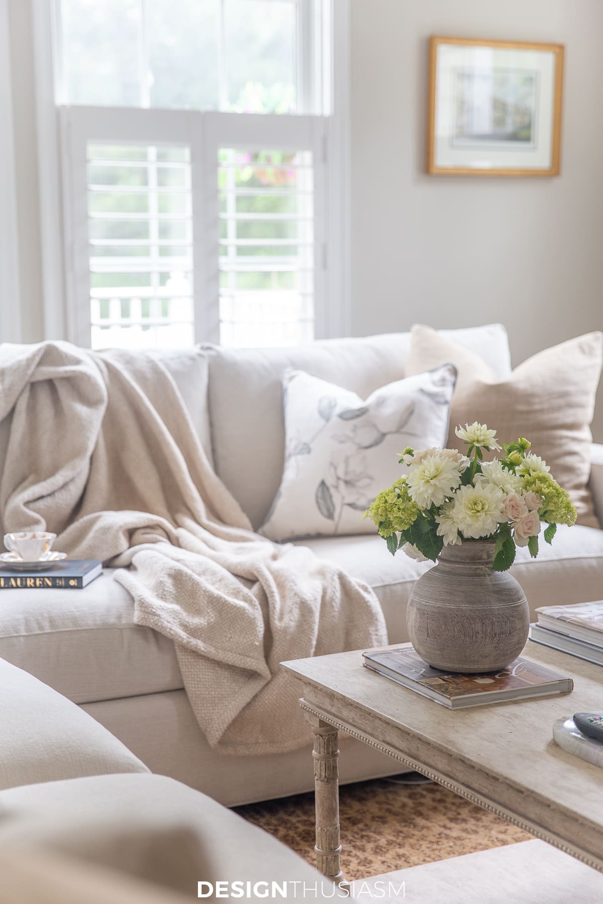 neutral family room with pale flowers
