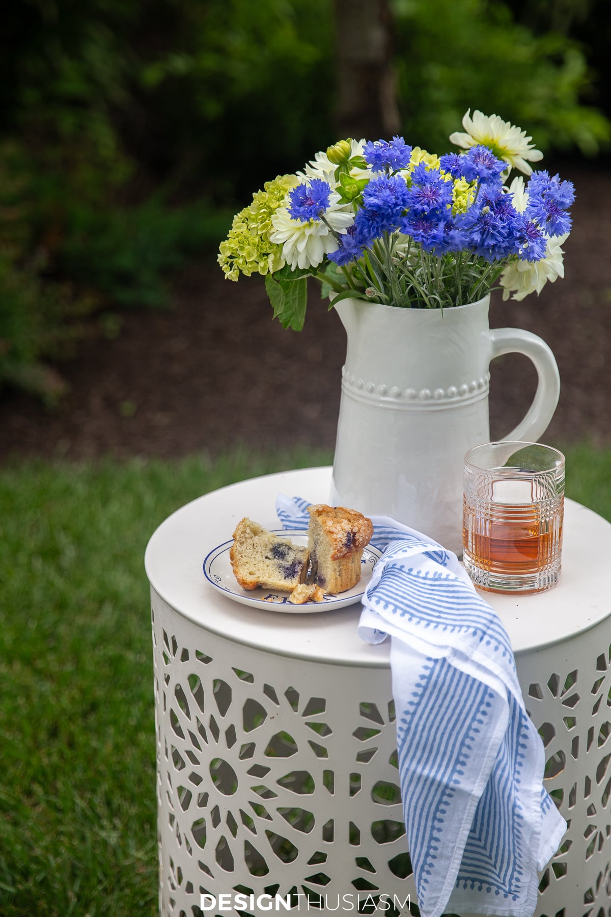 Outdoor drum table with flowers