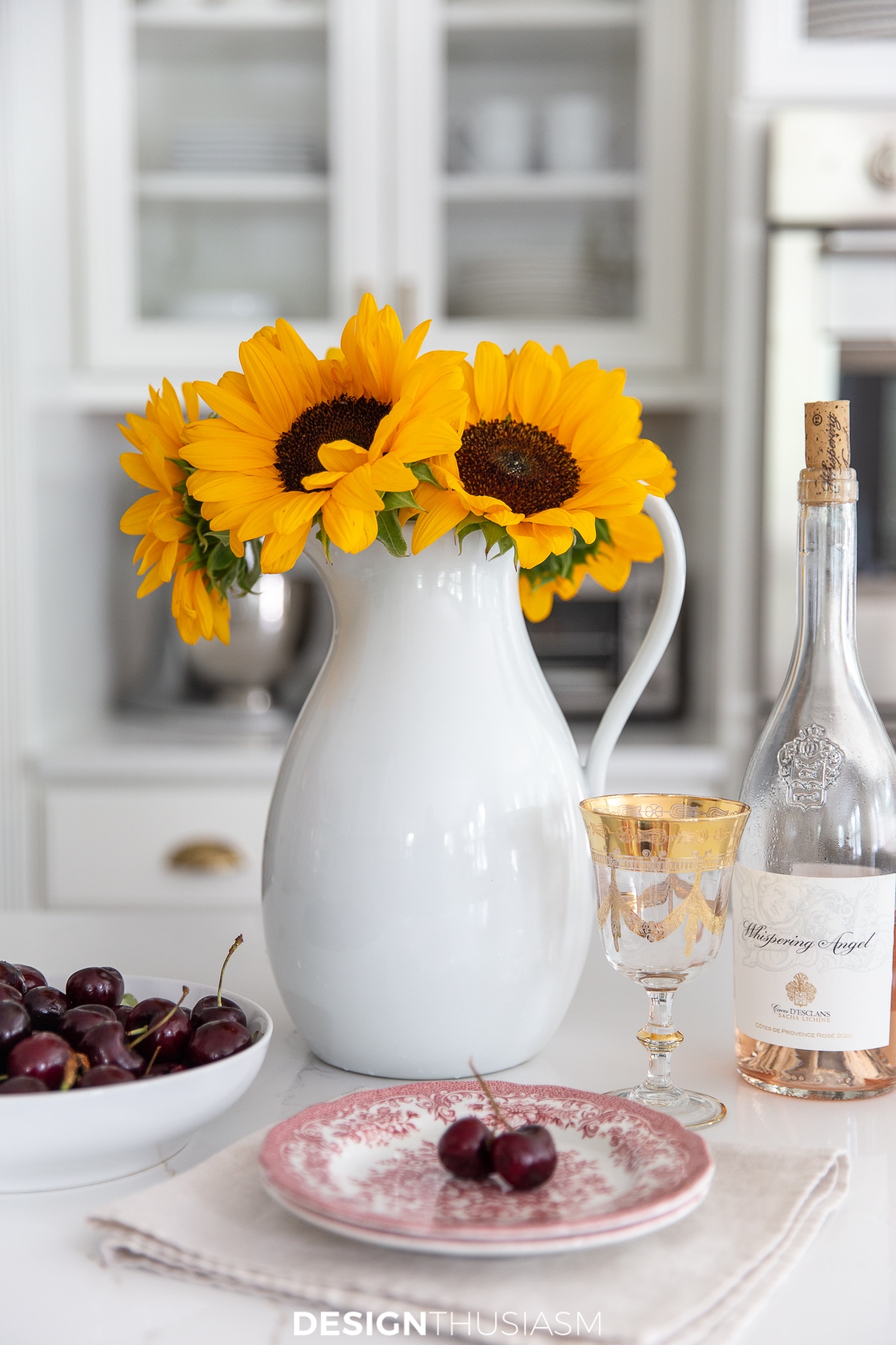 sunflowers in a white pitcher